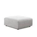 Taburet modular gri deschis din poliester cu design minimalist și colțuri rotunjite, picioare negre mici.