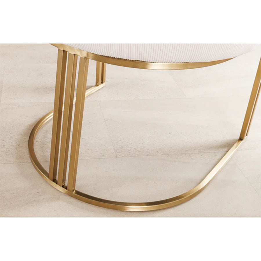 Bază scaun dining bej din metal auriu cu design modern și picioare subțiri arcuite.
